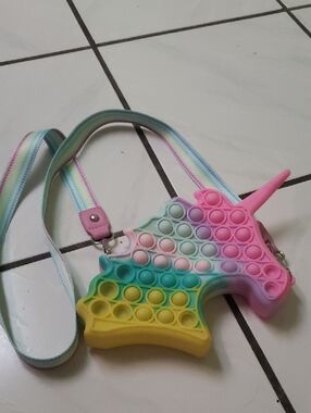 Like new "Unicorn" shaped pop -it crossbody bag
